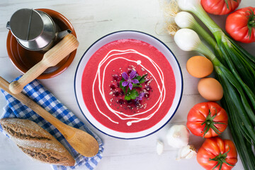 Vegan beet cream recipe decorated with flowers.