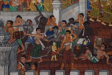 Old wall paintings from 1930 tell the story of Thai literature. Written on the wall in Wat Phra Kaew Bangkok, Thailand opened for tourists to visit and take photos on October 21, 2020.