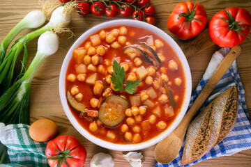 Chickpea stew with vegetables. Typical Spanish vegan recipe.
