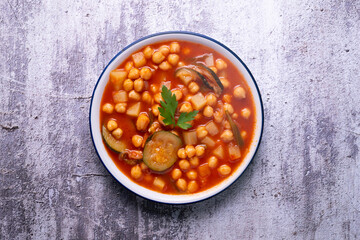 Chickpea stew with vegetables. Typical Spanish vegan recipe.