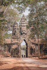 Siem Reap, Cambodia - March 18th, 2020 : ruin gate of the Angkor Wat religious complex 