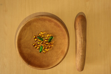 Vitamins and Medicine Tablets and Capsule on a Clay Plate with the Knead Tool