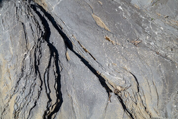 Granite river banks as a pattern, background, texture
