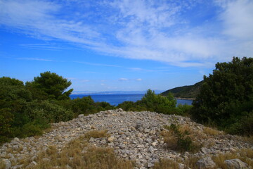 The landscape of the island of Vis, rocky beaches, steep cliffs, lonely islands

