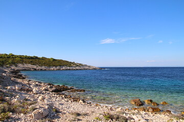 The landscape of the island of Vis, rocky beaches, steep cliffs, lonely islands

