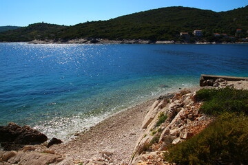 The landscape of the island of Vis, rocky beaches, steep cliffs, lonely islands

