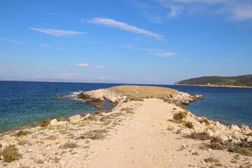 The landscape of the island of Vis, rocky beaches, steep cliffs, lonely islands

