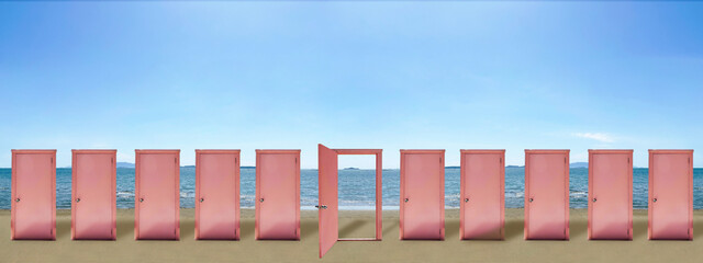海辺に立つ無数のモニュメント　ピンクのどこでもドア