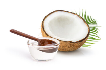 Cold pressed extra virgin coconut oil in glass bowl isolated on white background. 