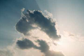 sun rays and clouds