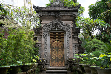 authentic gates 
sculptures Balinese gods creature 
religion 
hindu faith
Bali Indonesia
religion of Bali
