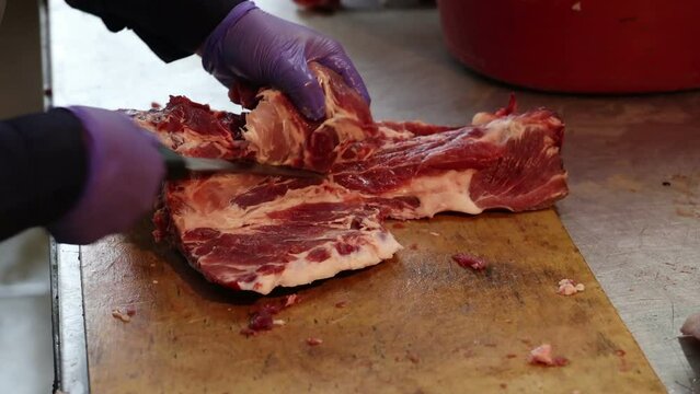 Production Of Minced Meat From Pieces Of Beef Meat At The Food Processing Plant