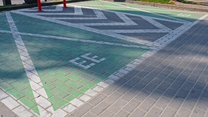 Reserved Empty Parking Spot with Charger for Electrical Vehicles