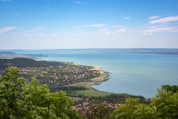Aerial view of Lake Balaton and the village of Ábrahámhegy, Hungary from the summit of Mount Badacsony in northeasterly direction.