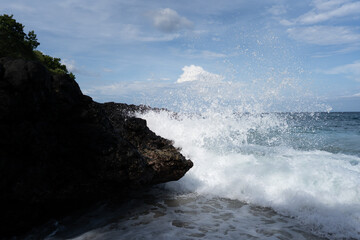 waves crashing on rocks