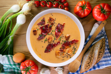 Tomato soup with crispy serrano ham.