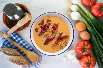Tomato soup with crispy serrano ham.