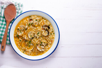 Rice soup with clams. Typical tapas recipe in a seaside town in Spain.