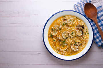 Rice soup with clams. Typical tapas recipe in a seaside town in Spain.