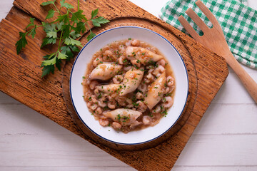 Squid with stewed prawns. Typical tapas of the Spanish coast.