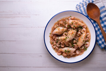 Squid with stewed prawns. Typical tapas of the Spanish coast.