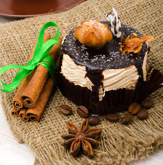 Caramel cake, mousse dessert on burlap. - obrazy, fototapety, plakaty
