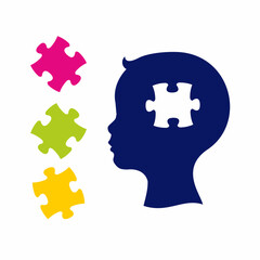 The profile of the child's head and puzzles. Symbol of autism.