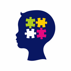 The profile of the child's head and puzzles. Symbol of autism.