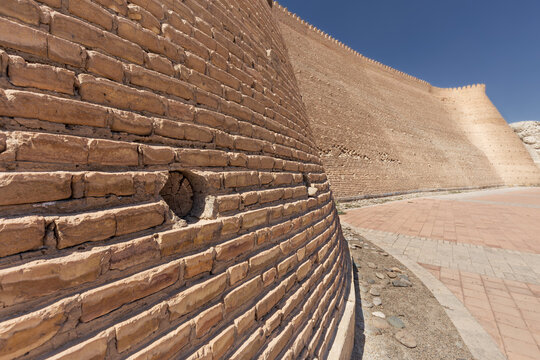 Ancient monumental archaeology heritage Ark citadel with brick walls and towers, Bukhara, Uzbekistan