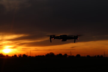 Drone in the foreground and sunset in the background
