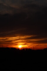 Obraz premium Beautiful sunset with orange and yellow clouds