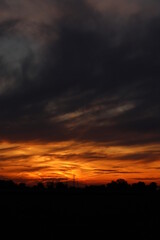Beautiful sunset with orange and yellow clouds