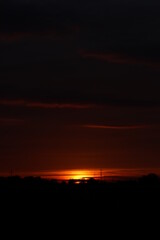 Obraz premium Beautiful sunset with orange and yellow clouds