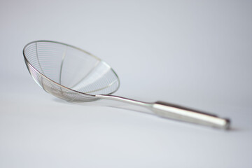 sieve kitchen chrome plated on isolated white background