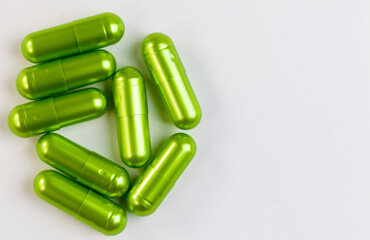 Colorful pill capsule on white background.