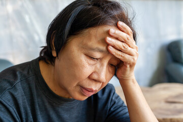 Sad lonely pensive old senior woman