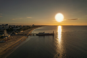 Fototapeta na wymiar Sunrise At Bournemouth Pier - Dorset, England