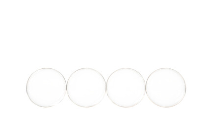 four glass spheres isolated and transparent 3D illustration rendering