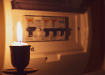 candle and electrical switches, electricity cut-off, blackout