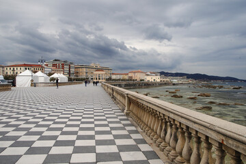 Fototapeta na wymiar The tiled promenade in Livorno, Italy