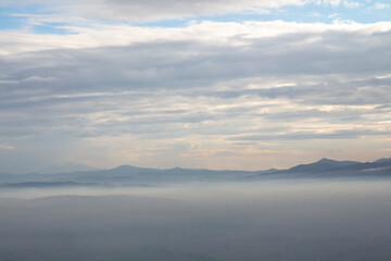 Fototapeta na wymiar landscape in the fog and clouds