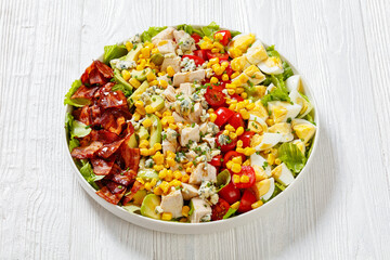 American garden salad on plate, top view