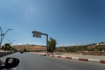 Car window view over the roadside in Fes