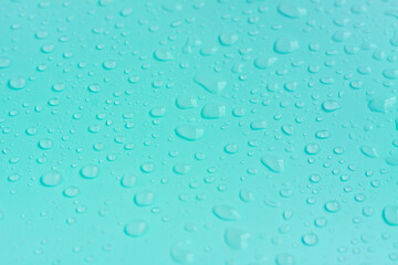 Fototapeta na wymiar Water drops on blue pastel color background