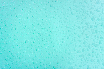Water drops on blue pastel color background