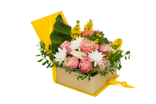 Original flower arrangement in a yellow gift box
