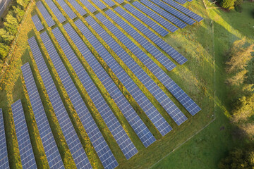 Solar panels in aerial view on famers field sustainable renewable energy