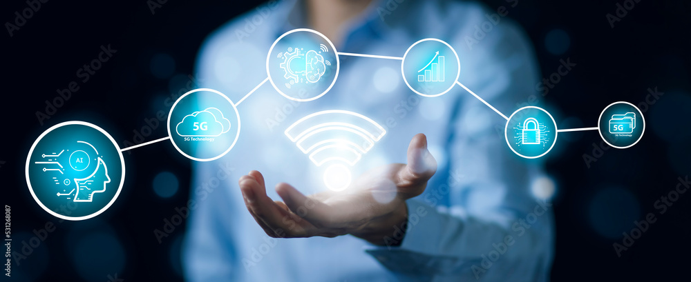 Poster businessman hold wifi with artificial intelligence (ai),on big data network machine learning and dat