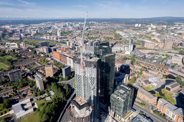 Manchester City Centre Drone Aerial View Above Building Work Skyline Construction Blue Sky Summer Beetham Tower Deansgate Square Glass Towers.