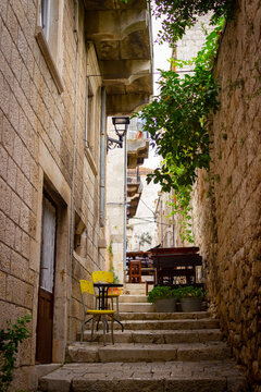 Korčula Old Town alley with plants and no people